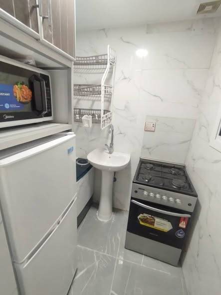 rent in Qudaibiya near Bahrain Pride room kitchen