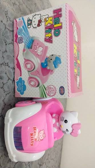 Hello Kitty car doll with lights and music