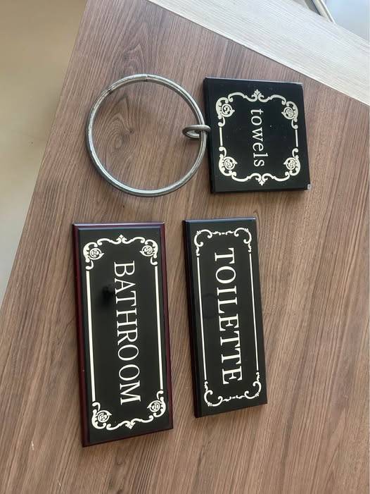 The set includes signs labeled Bathroom Toilet and