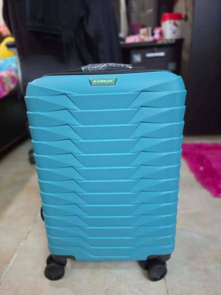 handcarry luggage Pick up in Adliya Price handcarry